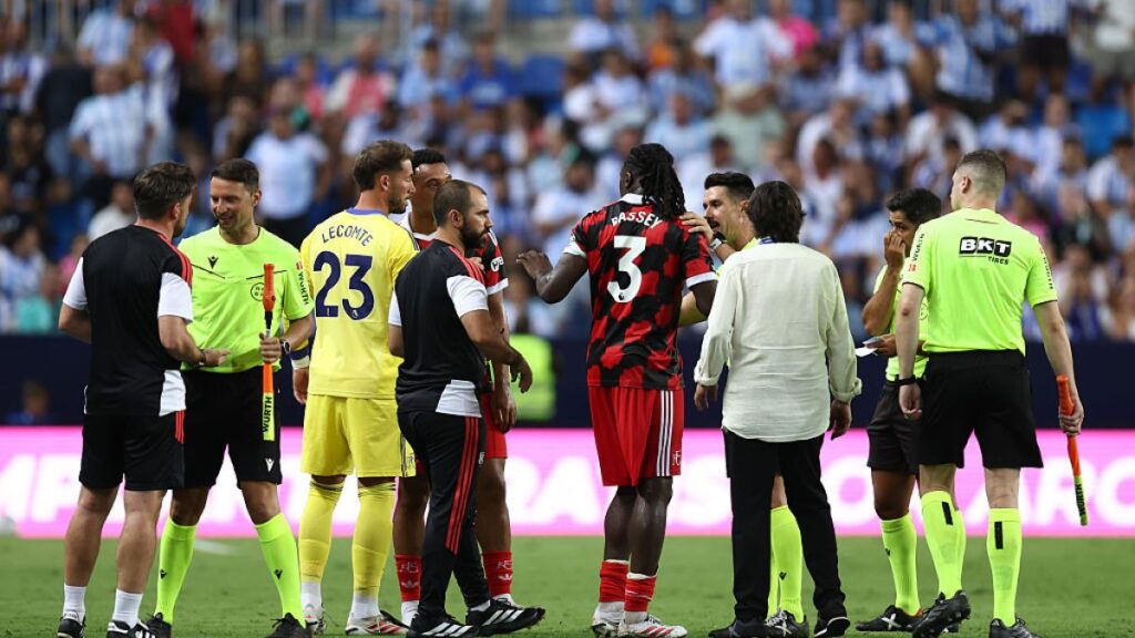 Ex-Real coach Arbeloa sent off while his Fulham team walk off in Malaga
