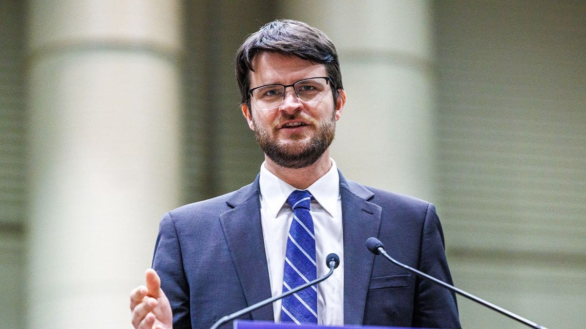 U.S. House candidate William Lawrence speaks at a rally with U.S. Senate candidate Abdul El-Sayed, U.S. Sen. Bernie Sanders and U.S. Rep. Alexandria Ocasio-Cortez in Lansing, Mich., on July 19, 2026.