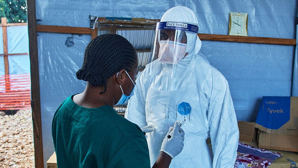 Health workers interact at the Evangelical Medical Center in Bunia.