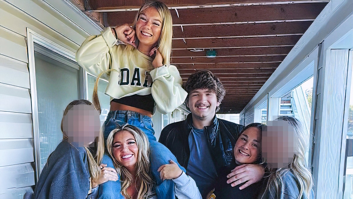 The University of Idaho students killed in a November 2022 attack pose together in the final photo taken of them all together, with the faces of two surviving roommates blurred.