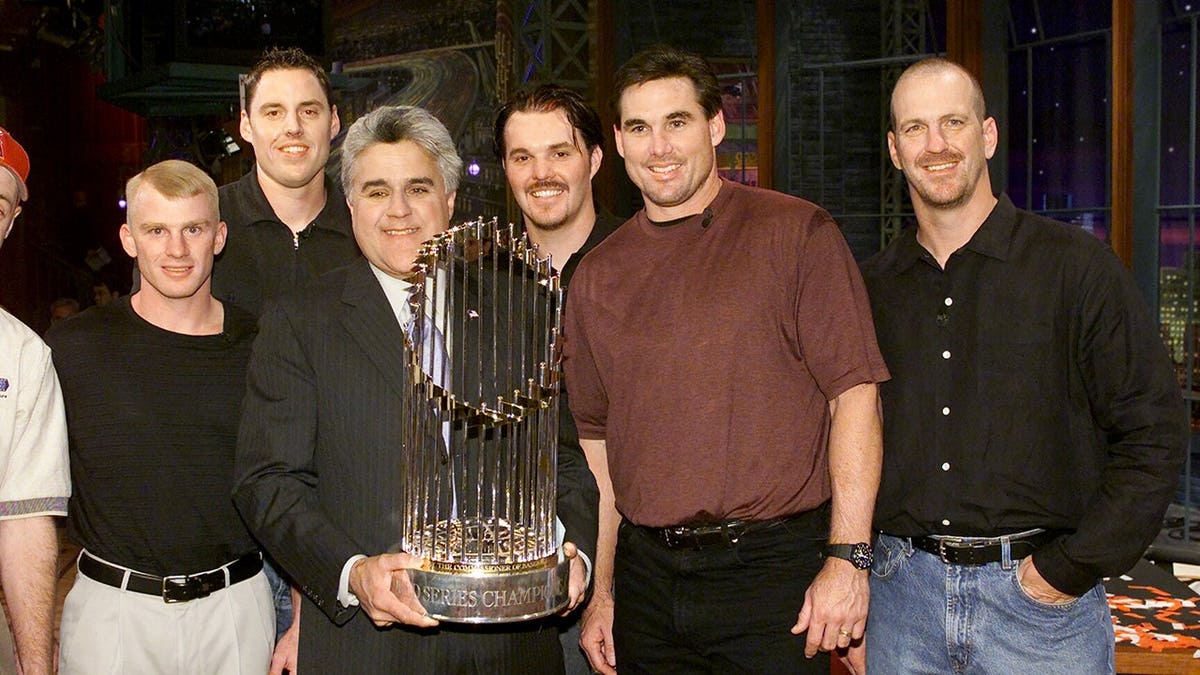 Jay Leno stands with five Anaheim Angels players on the set of The Tonight Show.