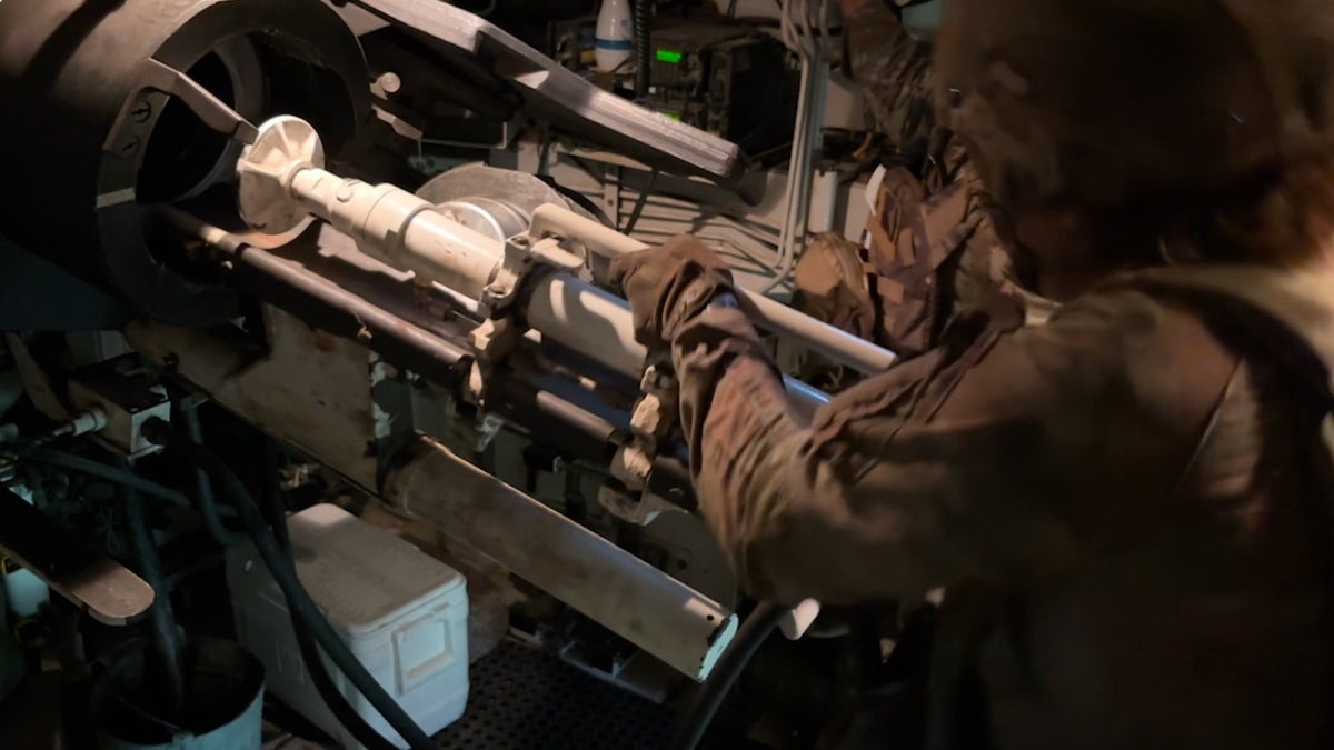 Soldiers train inside a Paladin howitzer during Northern Strike in Michigan.