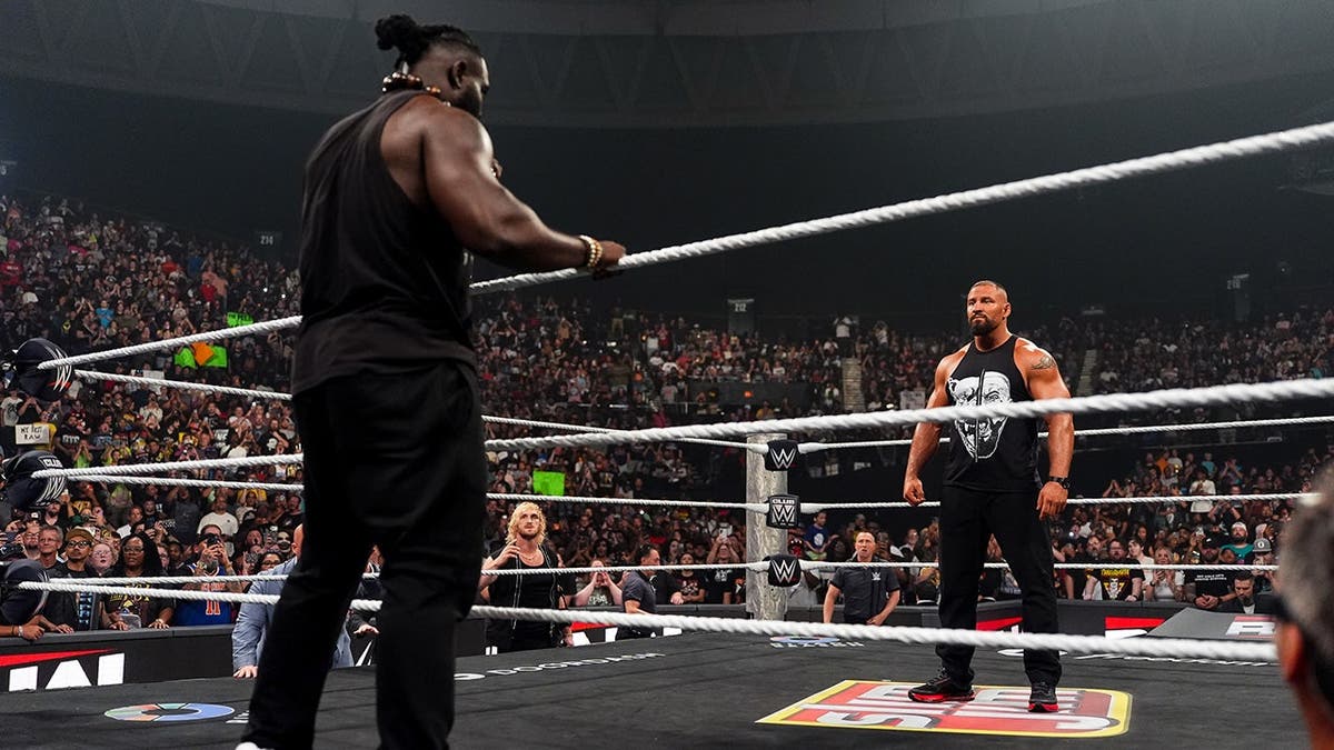 Oba Femi and Bron Breakker face off in the ring during RAW at Scope Arena.