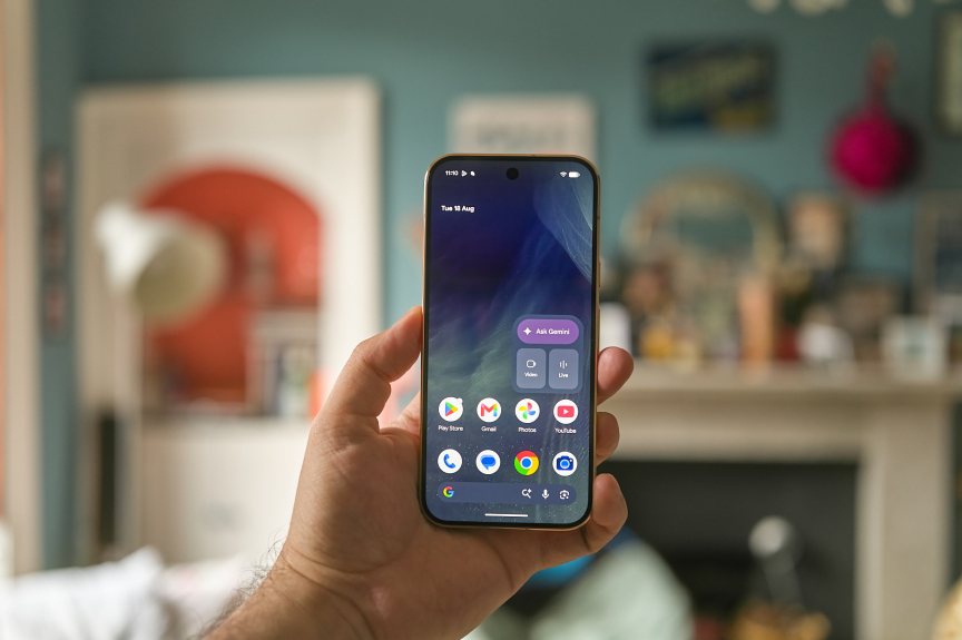 Image showing a Google phone being held up. The screen is on.