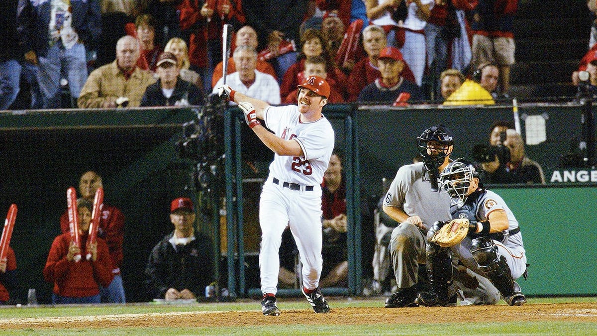 Scott Spezio swings during a home run at bat in Anaheim, Calif.