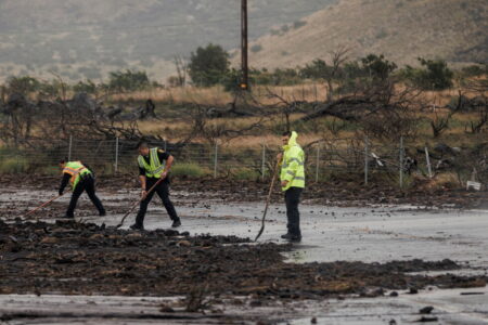 Lala weakens to a tropical storm, raking Hawaii with high winds and rain