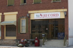 Small Kansas town to pay $850K to settle lawsuit over raid on newspaper