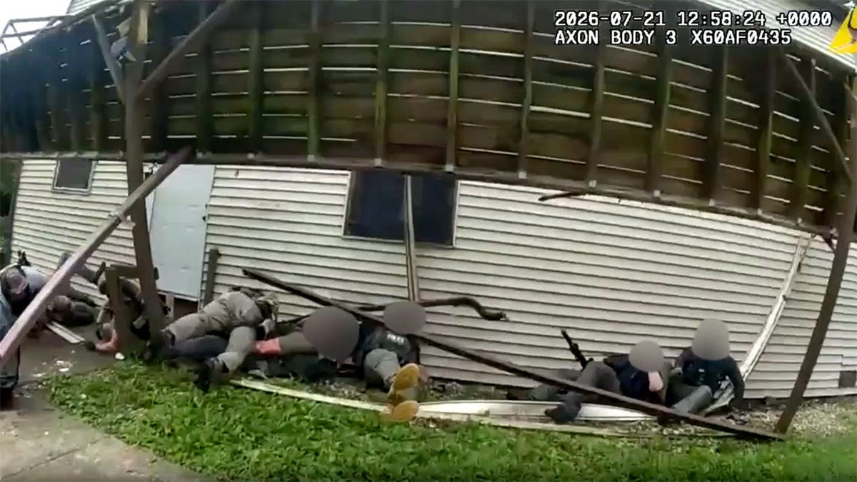 Members of task force seen on ground after deck collapse