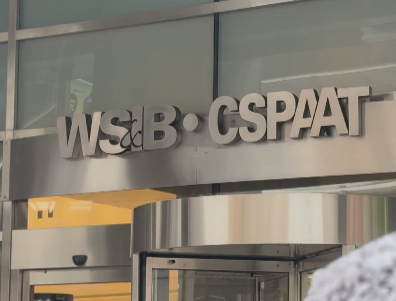 A sign at a WSIB office building.