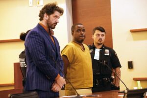 Mom of innocent 12-year-old gunned down by career criminal fights back tears as alleged killer makes first court appearance