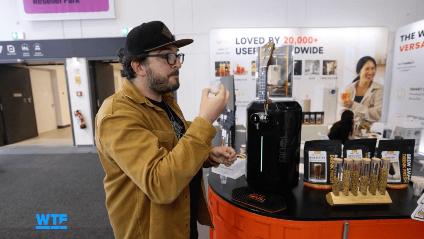 The writer drinking a very small sample of freshly made beer at IFA.