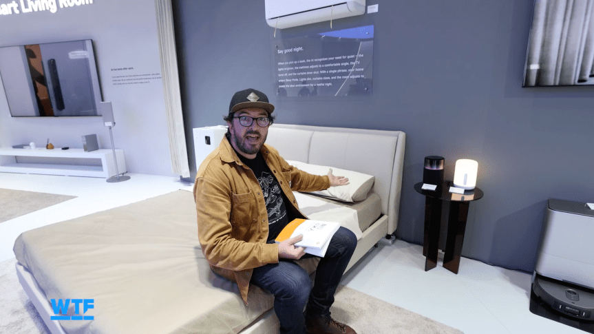 The writer looking confused at a water bottle that has come out of an extremely cold fridge showcased at IFA.