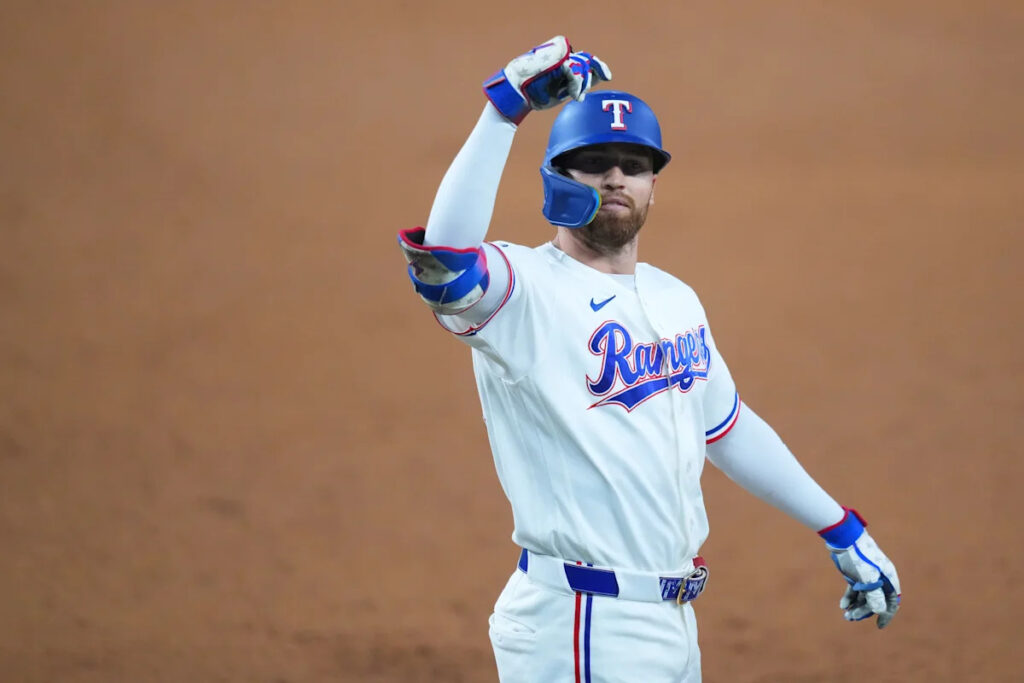 Brandon Nimmo has 4 hits and 5 RBIs as Rangers beat A’s 8-5 to close gap on Astros in AL West