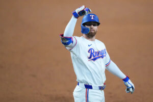 Brandon Nimmo has 4 hits and 5 RBIs as Rangers beat A’s 8-5 to close gap on Astros in AL West